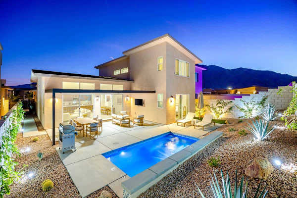 The whole place lit up at night – pure Palm Springs magic.