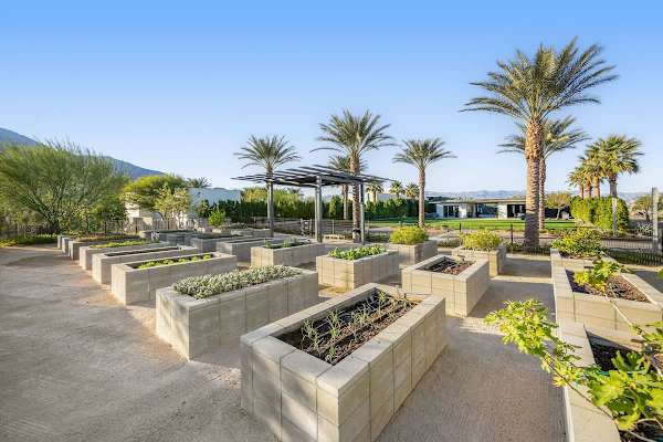 Community garden beds where you can grow your own herbs and veggies year-round.