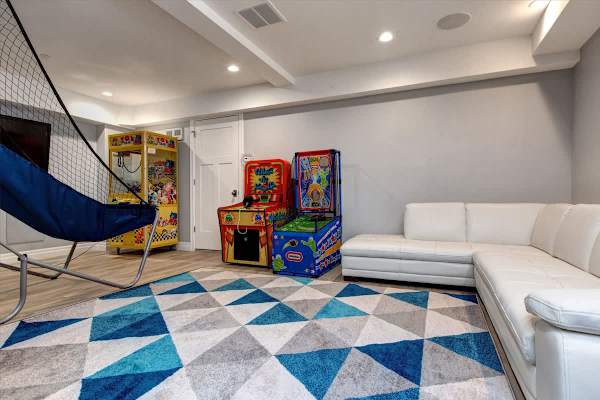 Media Room | Lower Level, TV, Shuffleboard, Arcade Legends, Guitar Hero, Whac-a-Mole & More! | Abode at First Chair