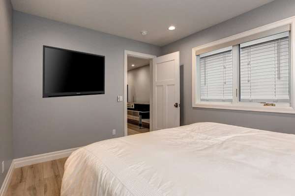 Bedroom 4 | Lower Level, King Bed, TV, Closet, Full Ensuite Bathroom with Shower | Abode at First Chair