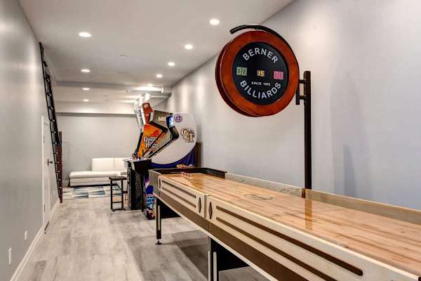 Media Room | Lower Level, TV, Shuffleboard, Arcade Legends, Guitar Hero, Whac-a-Mole & More! | Abode at First Chair
