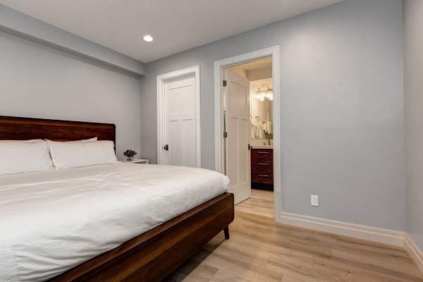 Bedroom 4 | Lower Level, King Bed, TV, Closet, Full Ensuite Bathroom with Shower | Abode at First Chair