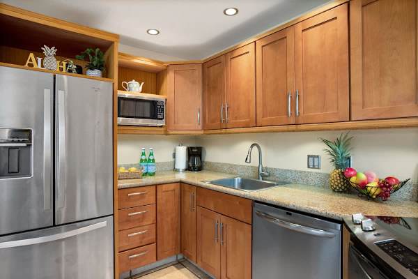 Kitchen comes with coffee maker, rice cooker, blender, toaster, and kettle
