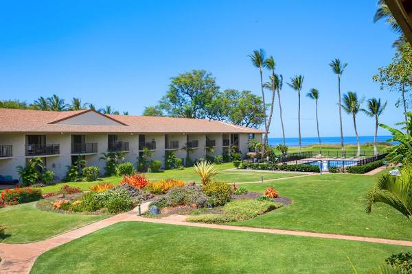 View of the backyard and ocean from the lanai