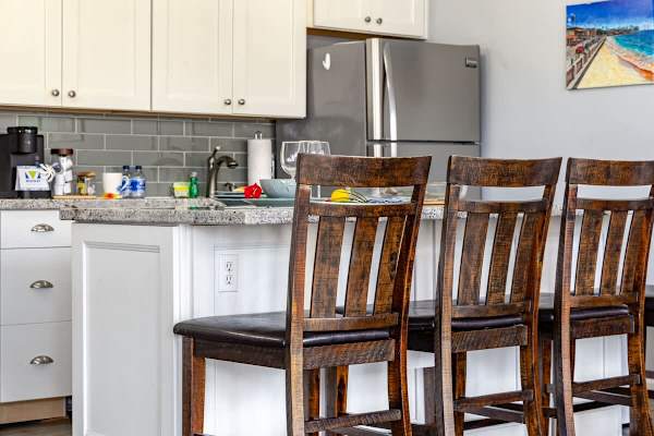 Dining counter with 4 car chairs
