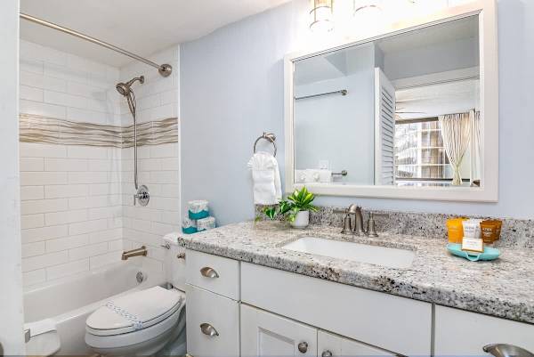 Full bathroom with tub and shower combination