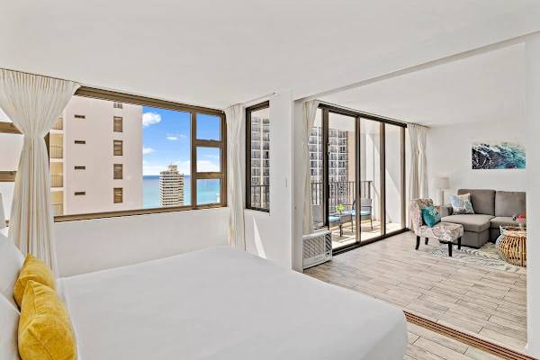 The bedroom is separated in the living room by a sliding door.