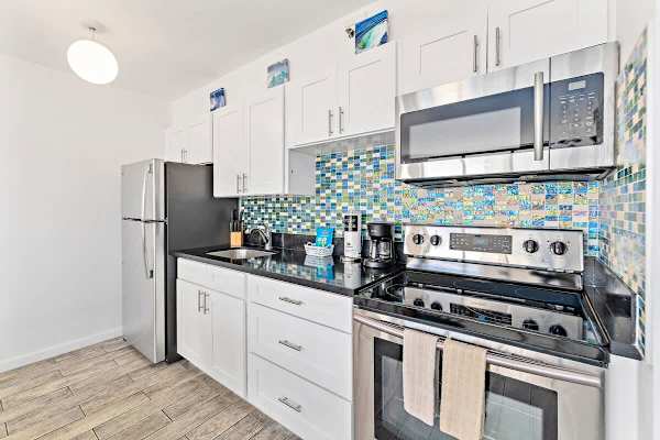 The fully equipped kitchen is perfect for your culinary needs!