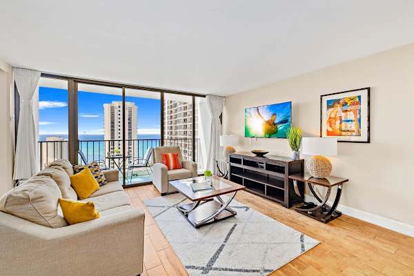 The living room features a sleeper sofa, window AC, and a smart TV perfect for your relaxation!
