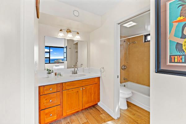 This unit has a full bathroom with a tub and shower combination!