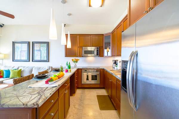 Kitchen with microwave, cook top stove, oven, dripped coffee maker, dishwasher, fridge and freezer!