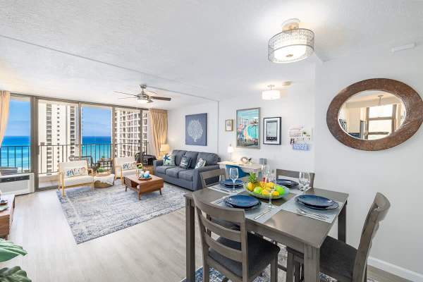 Living room with great frontal Ocean views and pull-out sleeper sofa and have your breakfast on your dining table with 4 seats.