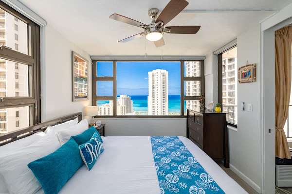Bedroom with king size bed, ceiling fan and Ocean views