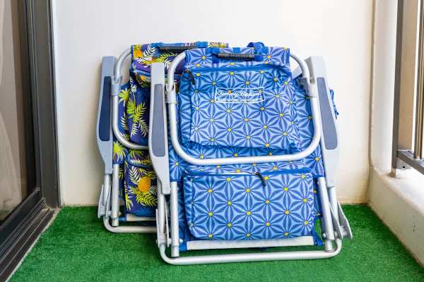 Folded beach chairs are stored on the balcony for your beach use!