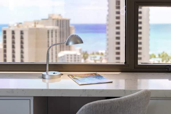 Work or relax at the desk with ocean views through the window.