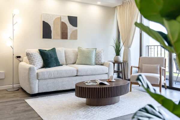 Unwind in your living area while enjoying the mountain views from your floor-to-ceiling glass windows.