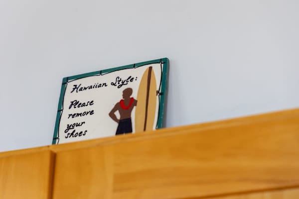 Charming framed art adds a playful, local touch to the space.
