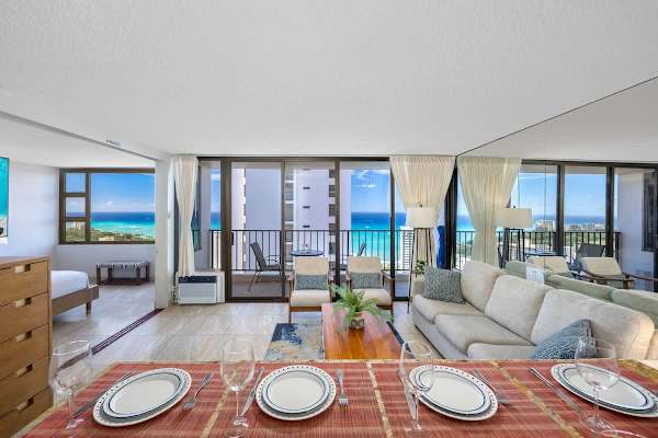 Dining area set & ready for a meal together w/ open views into the living space.
