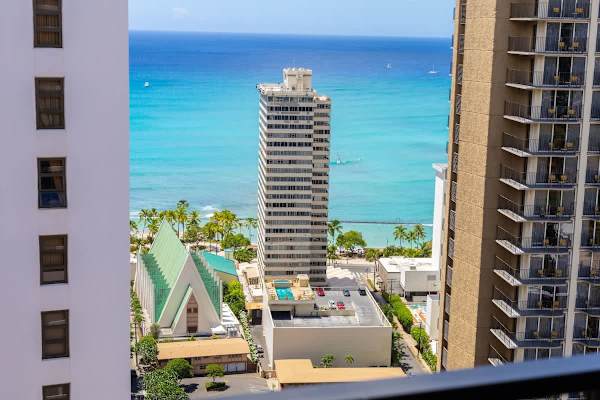Marvel at the breathtaking city and ocean views from the balcony, offering a panoramic backdrop to your stay.