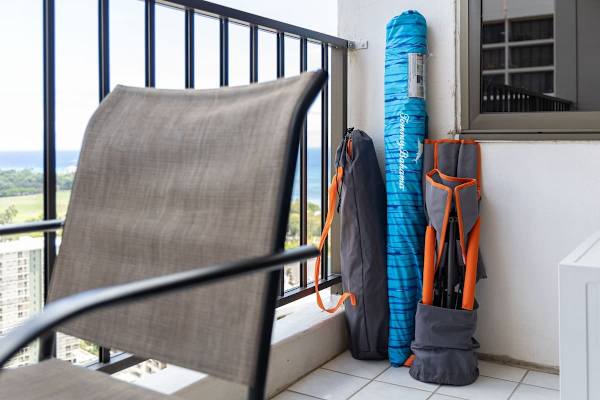 Relax on the balcony with a view and convenient beach gear storage.