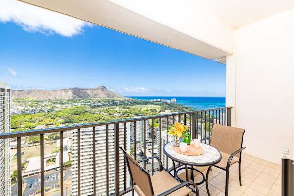 Relax on the balcony with panoramic views of the ocean and mountains.