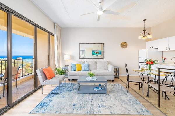 Bright living area with ocean views and modern dining space.