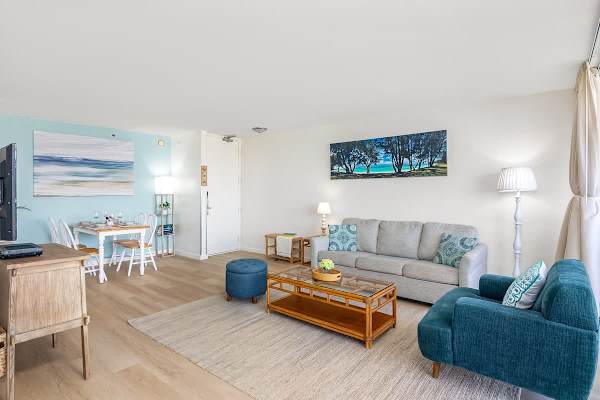 Bright living room with coastal-inspired decor and comfortable seating.