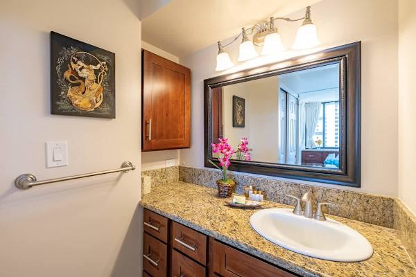 Full bathroom with vanity and cabinet. 
