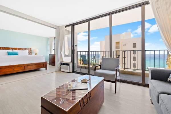 The bedroom is separated from the living room by a sliding door!