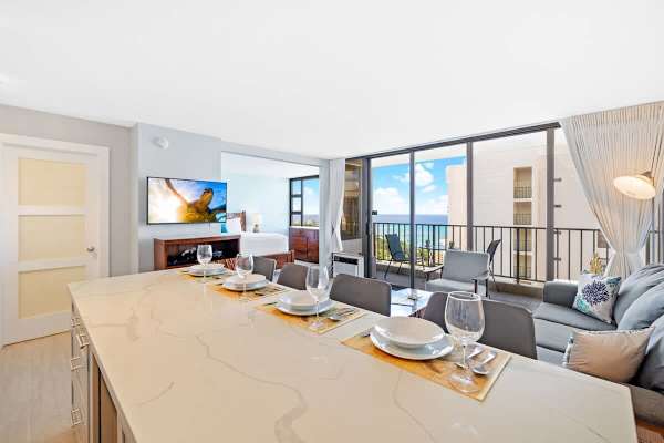 The unit has a flat-screen TV that you can enjoy from the living room!