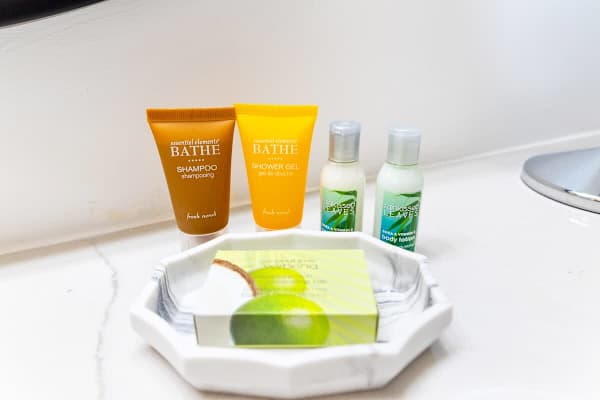 Complementary toiletries to get you started include soap, shampoo, conditioner, body wash, and lotion
