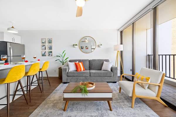 Living room includes queen size sofa bed