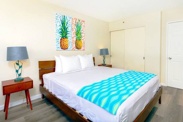 Bedroom with a king-size bed and bathroom access