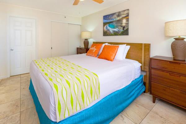 Bedroom with a king size bed and bathroom access