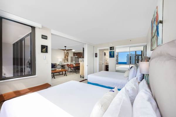 Relax in your comfortable bedroom with 2 queen beds and quick access to the bathroom.