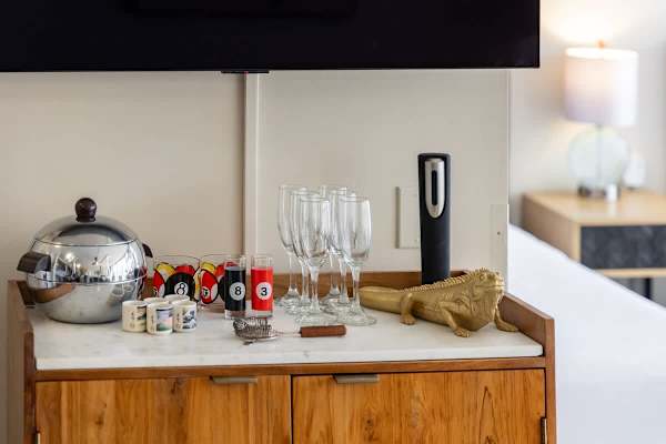 Your dry bar is stocked with glassware, an ice bucket, and all the tools for a celebratory drink.