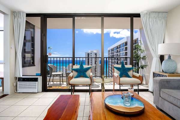 This is the view you came for! Relax in your coastal-chic living room and soak in the bright blue ocean right from your balcony.