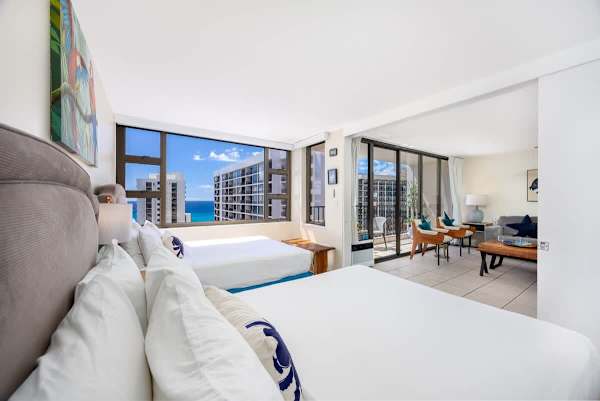 Enjoy the comfort of your 2 queen beds and open up to the living area and balcony, all with stunning ocean views.