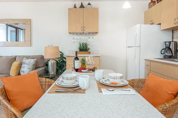 Dining table with 2 comfortable chairs perfect for shared meals