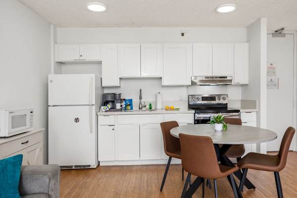 Full kitchen and dining area