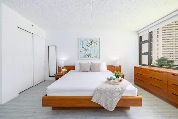 King size bed with closet and dresser