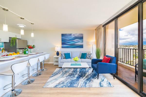 Living room with sleeper sofa window AC and balcony with gorgeous views 