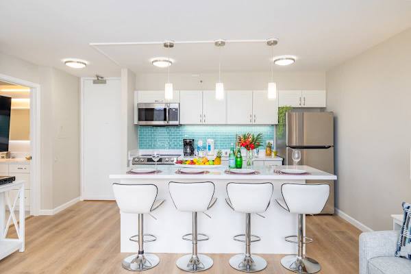 Fully equipped kitchen. Access to the bathroom also from  the living room.