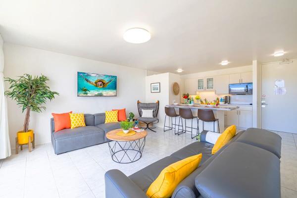 Spacious living space with two comfortable sofas.