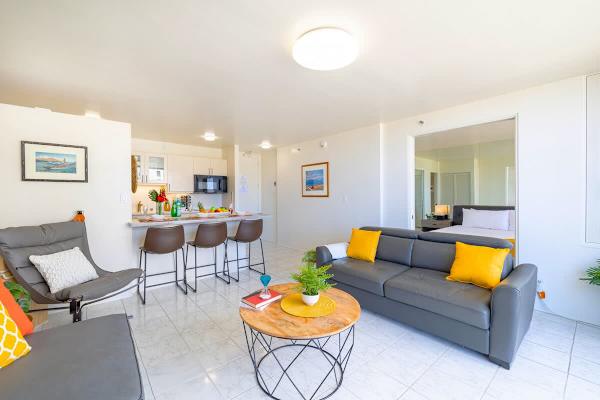 Living room with sliding door separating the two ambiances 