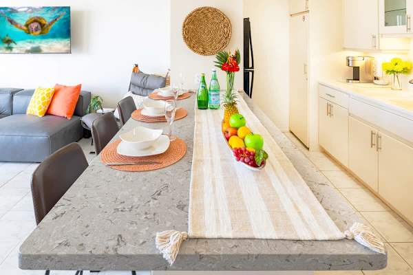 Countertop for your dining space with 3 bar stools.