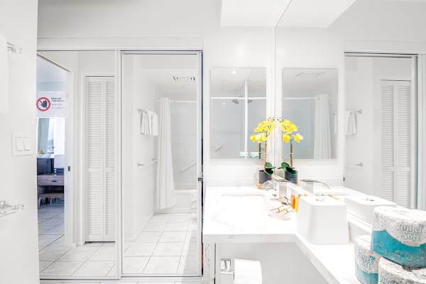 Full bathroom with vanity and cabinet
