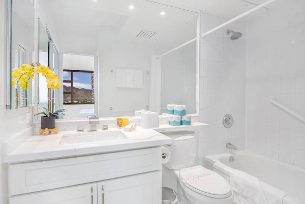 Full bathroom with tub and shower combo.