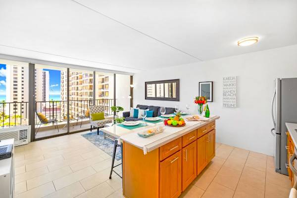 Countertop with cabinets and also dining area 