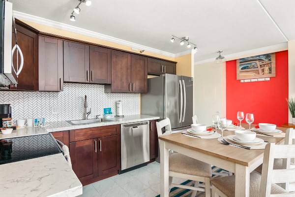 Cook delicious meals in your fully equipped kitchen with full-size appliances, and with dishwasher. Plus, share them with loved ones at your dining table with 4 chairs.